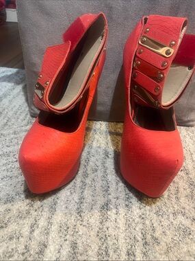 Women's Red Platform Pumps with Decorative Gold Accent Strap